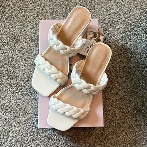 White heeled sandals